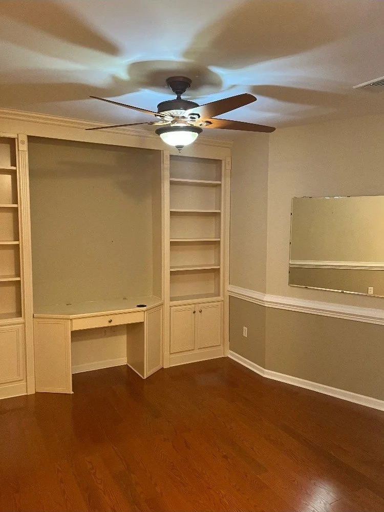 Custom built-in bookshelves and desk unit with hardwood floors in Montgomery County PA