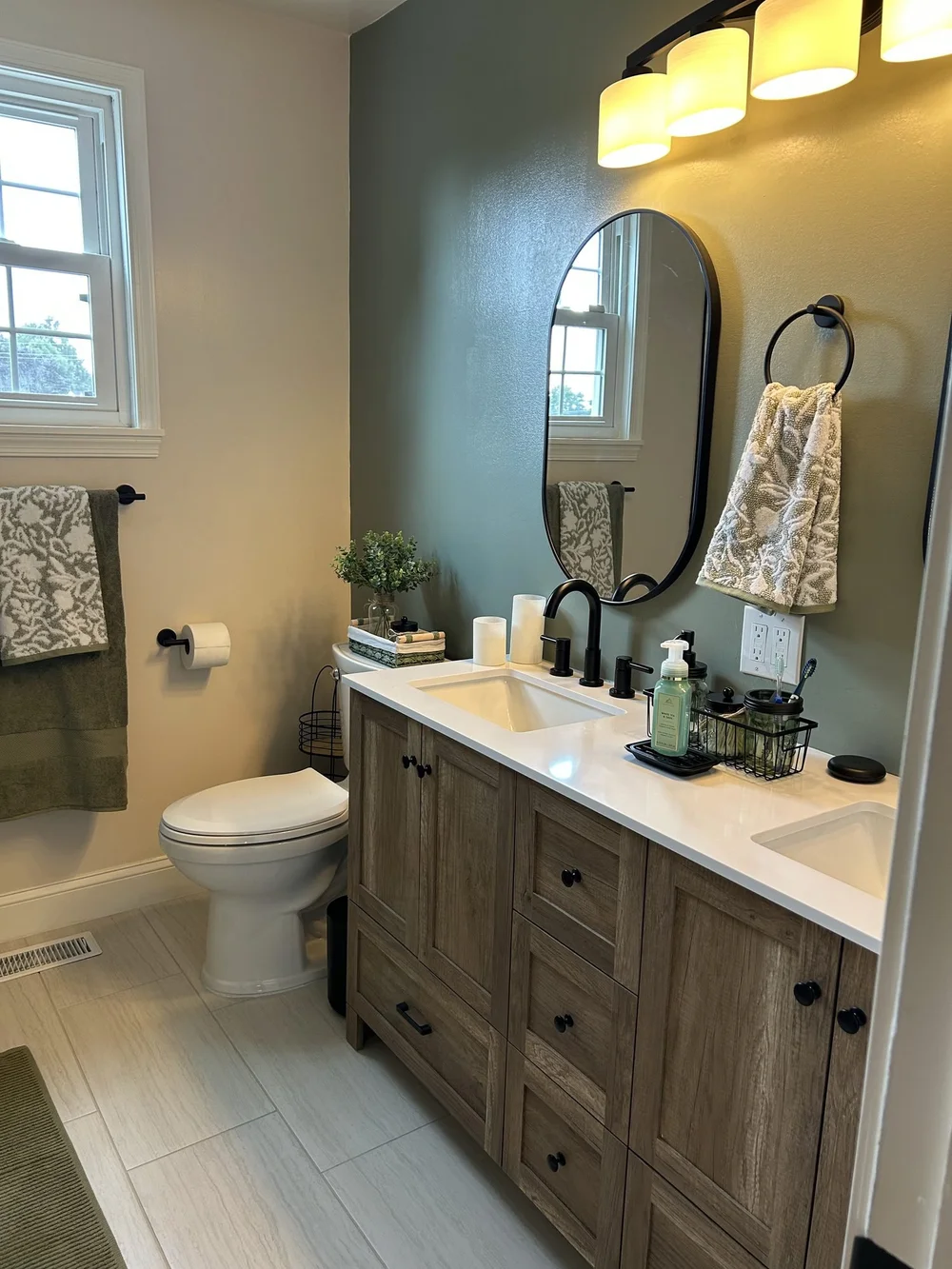 Langhorne bathroom after remodel with tiled shower and glass door