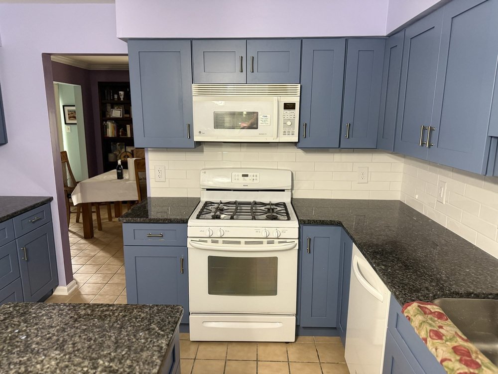 Kitchen range wall with tile backsplash in Elkins Park