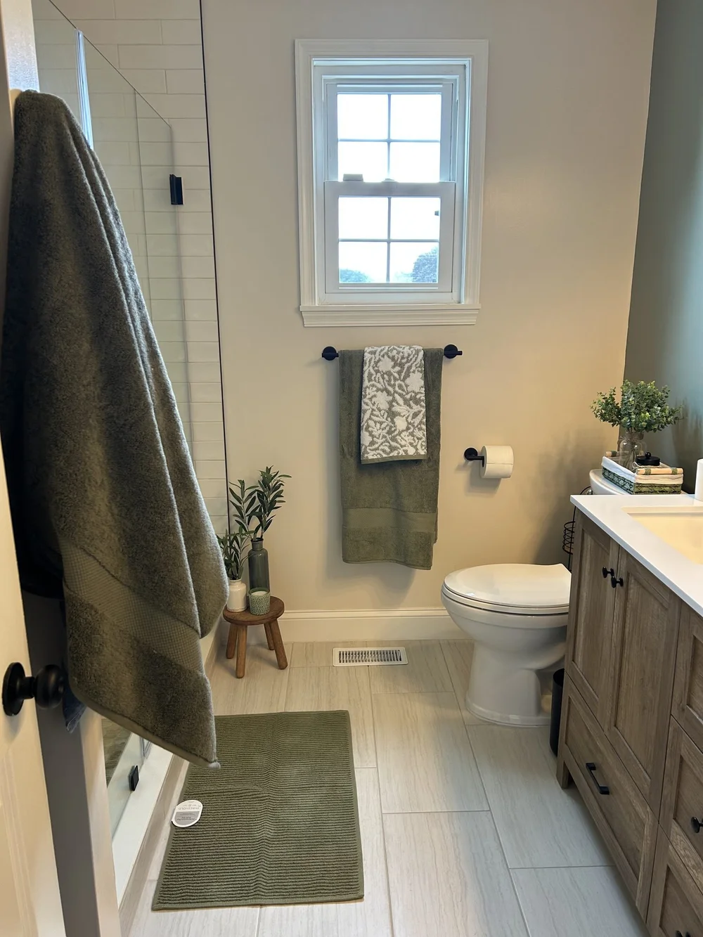 Tiled walk-in shower with niche and glass door, Langhorne bathroom remodel