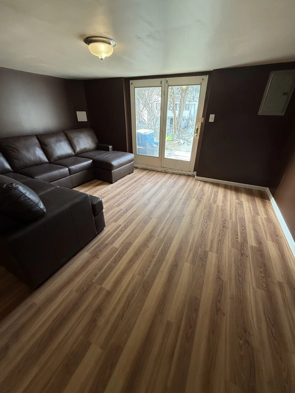 Basement after finishing by JMJ Home Remodeling — finished lounge and bar area in Northeast Philadelphia