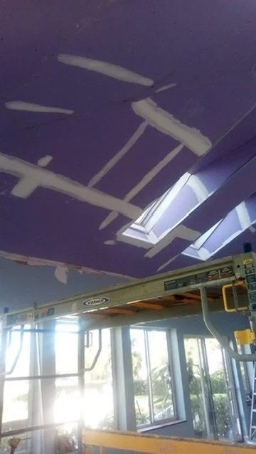 KSG ceiling renovation with drywall joints being finished around skylights