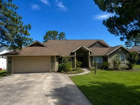 Before painting — front elevation and garage