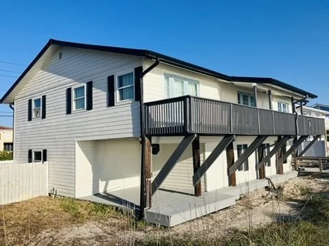 Raised rear deck and exterior stairs