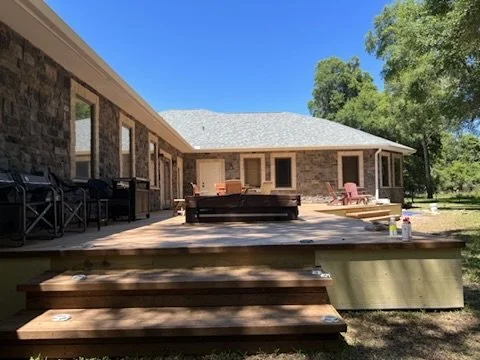 Deck boards and broad wooden stairs under construction