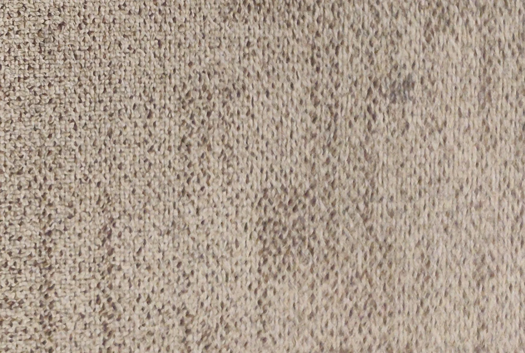 Close-up of carpet fibers and soft surface texture