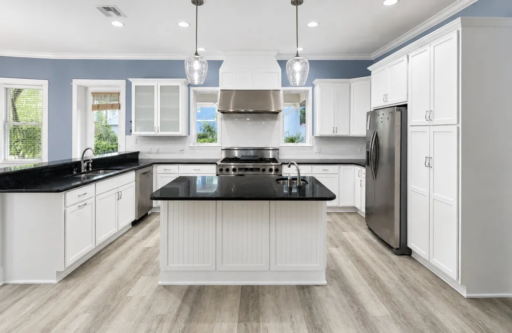 White kitchen cabinetry and island refinished by KSG