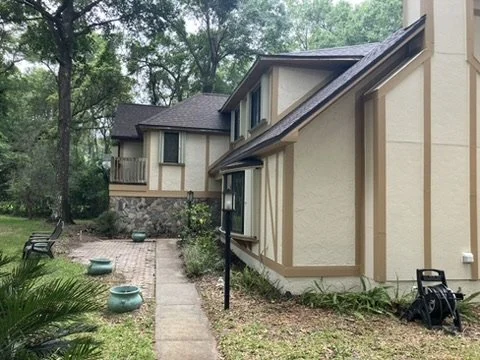 Traditional exterior viewed from the side yard