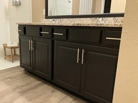 After refinishing — Tricorn Black cabinet doors and drawer fronts