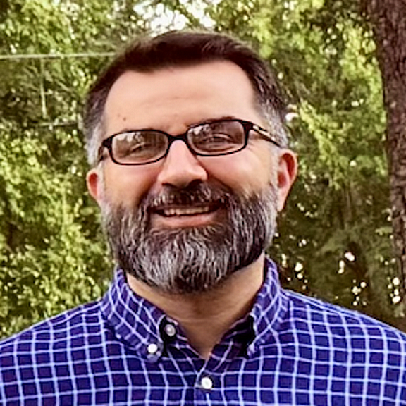 Dcn. Adam Conque