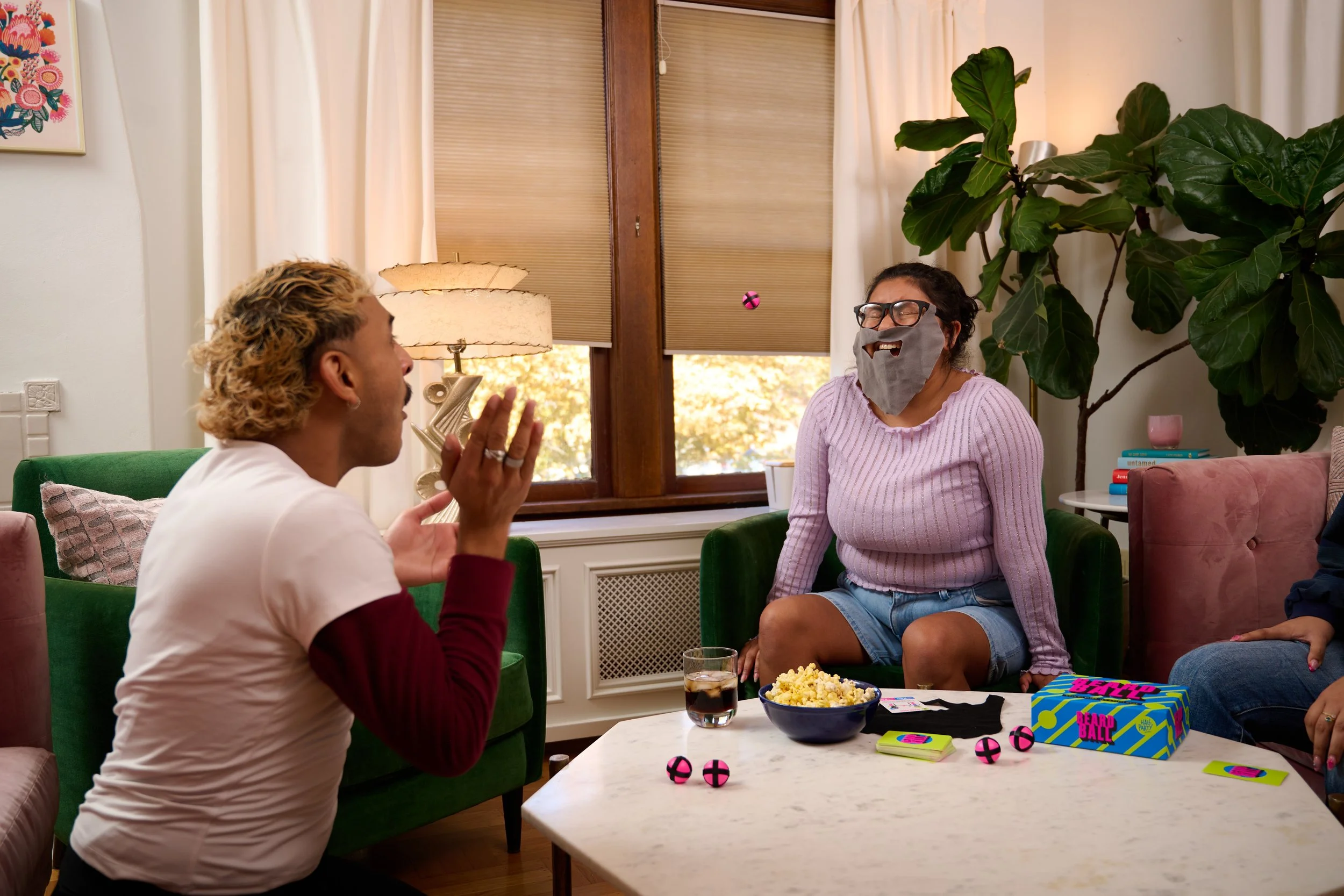 Friends enjoying a Hall Party game together