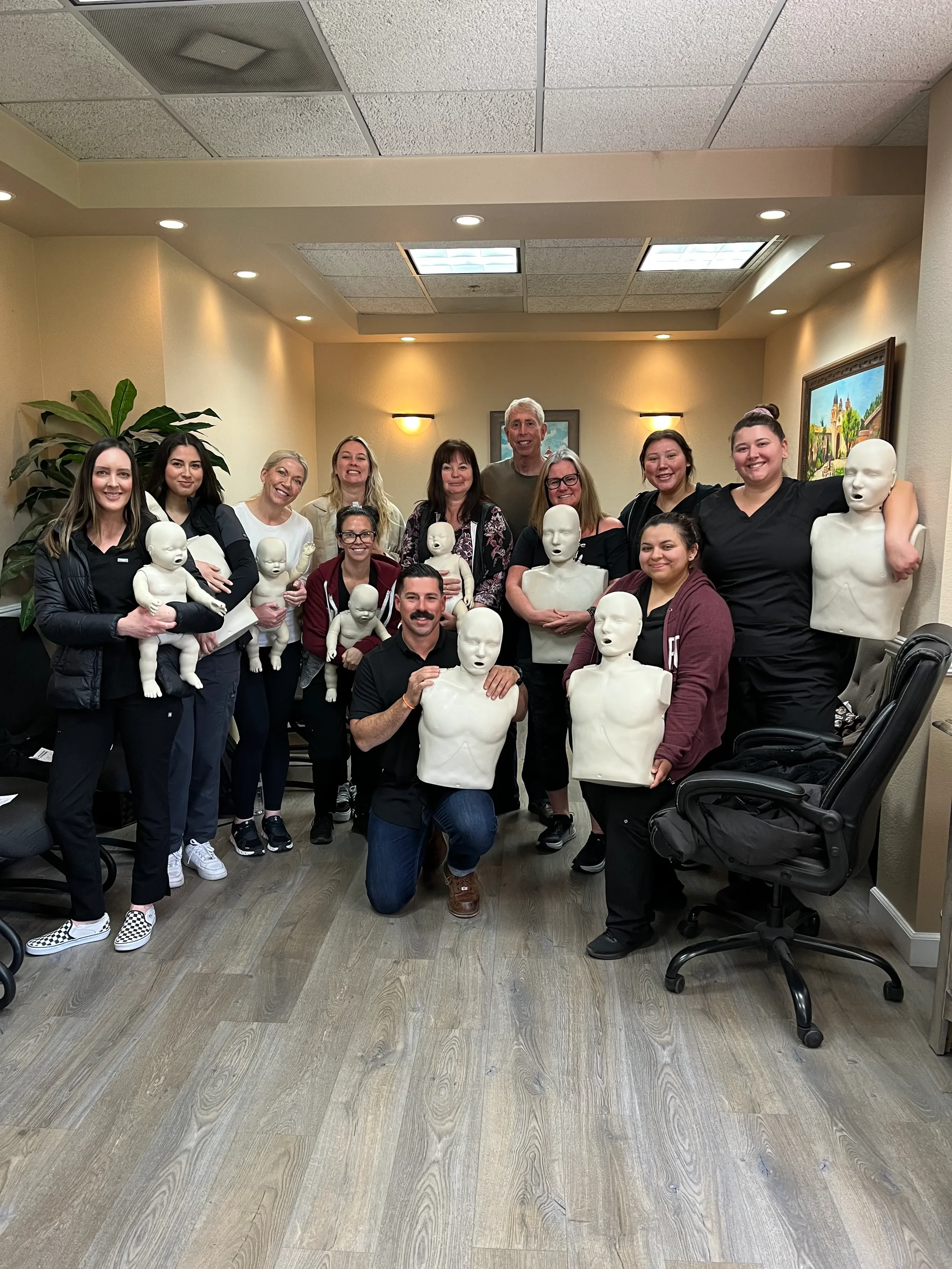 Healthcare team CPR training at a medical office