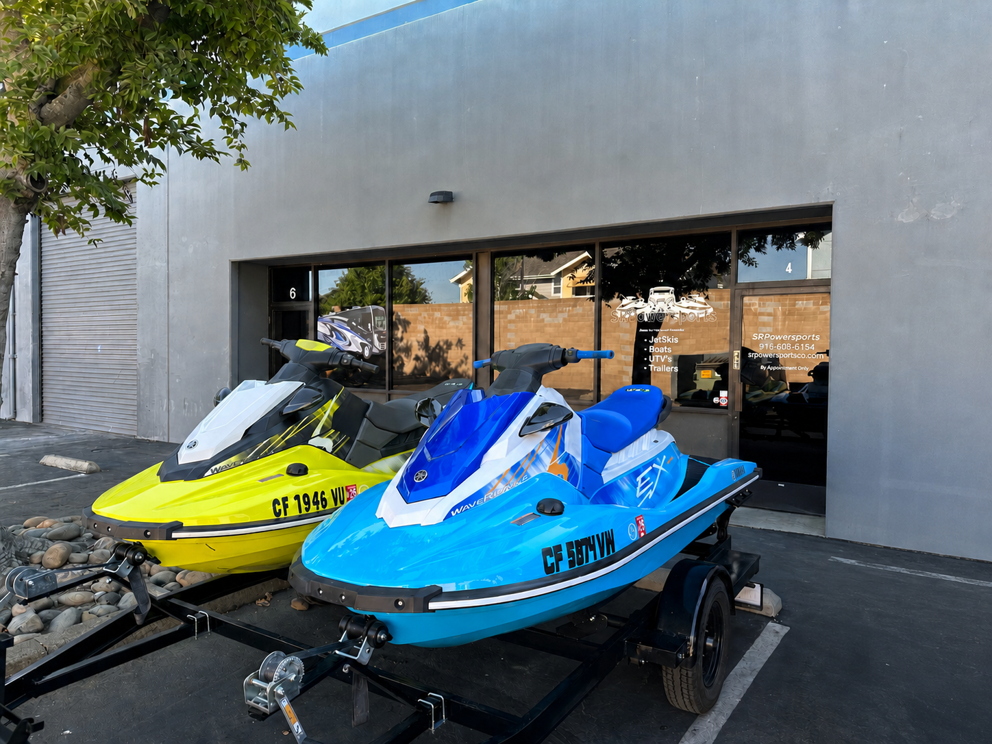 Two Yamaha EX Sport jet skis