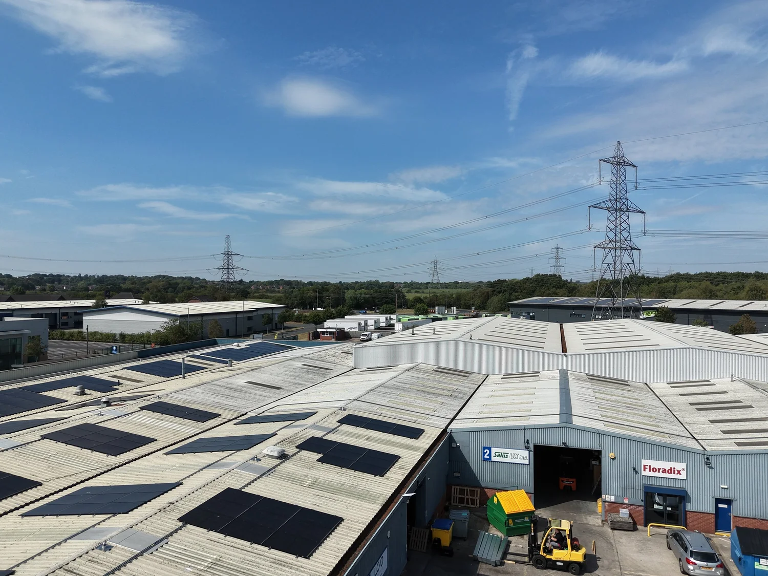 Aerial view of industrial units with rooftop solar panels on a Focus Industrial estate