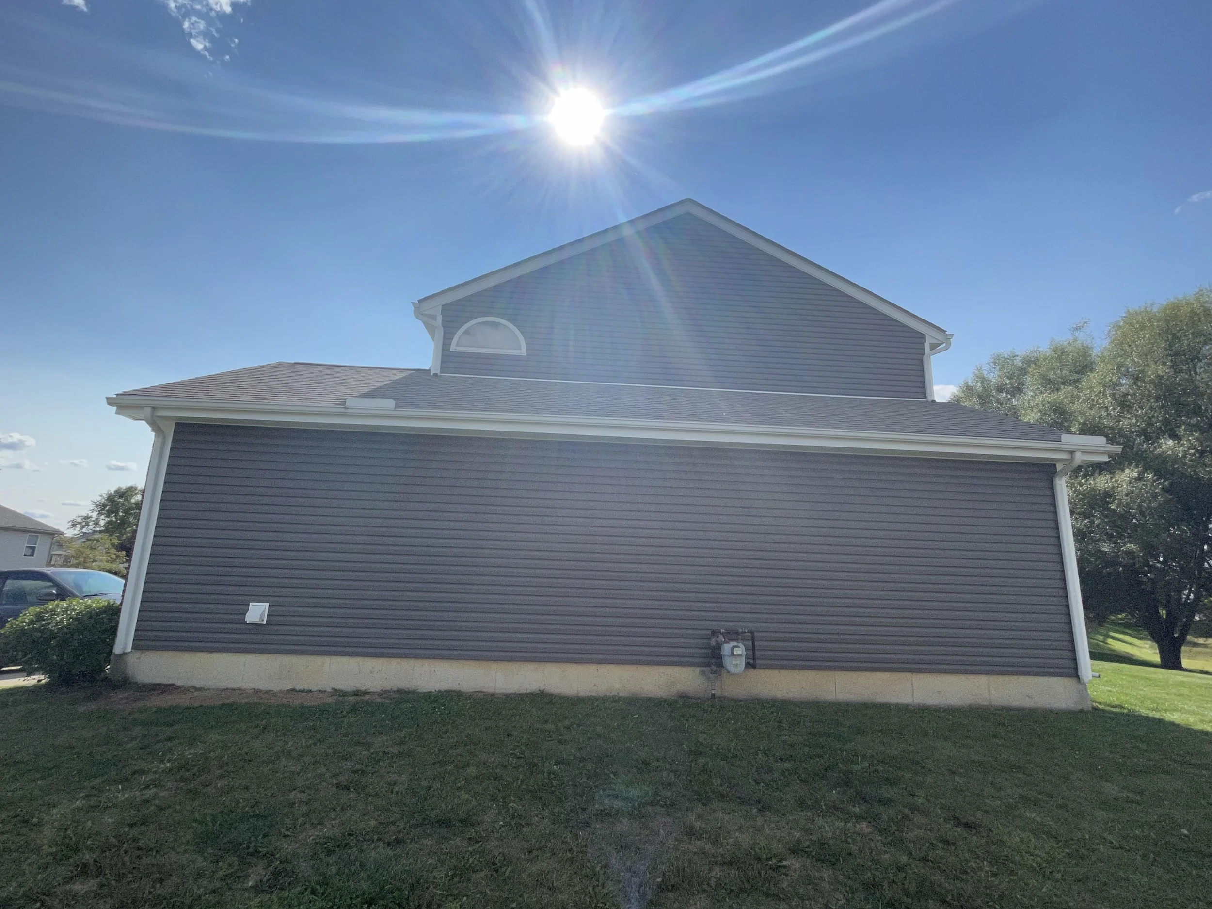 Completed roofing and exterior project on a residential property