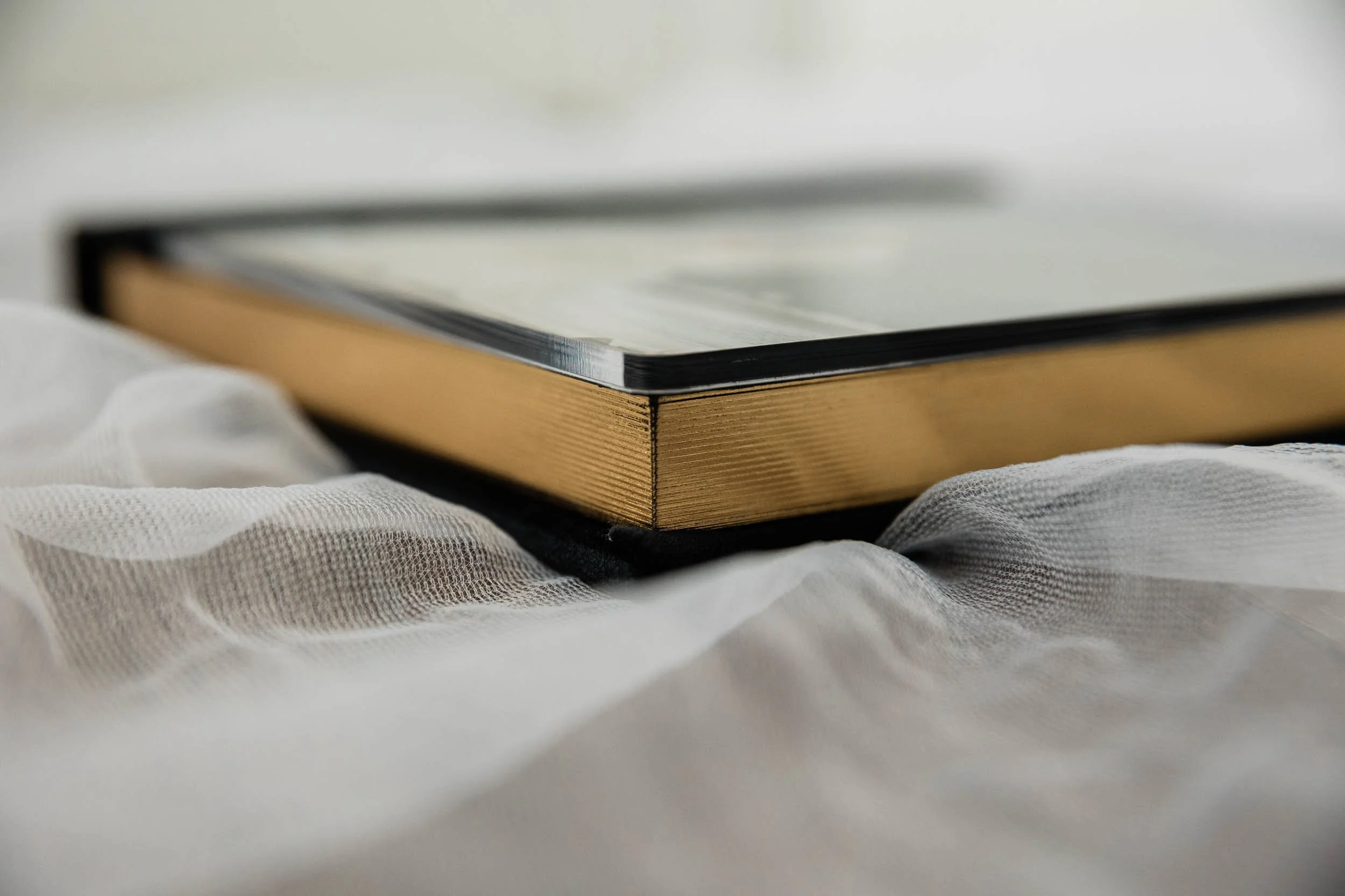 Gold page gilding on a layflat wedding album