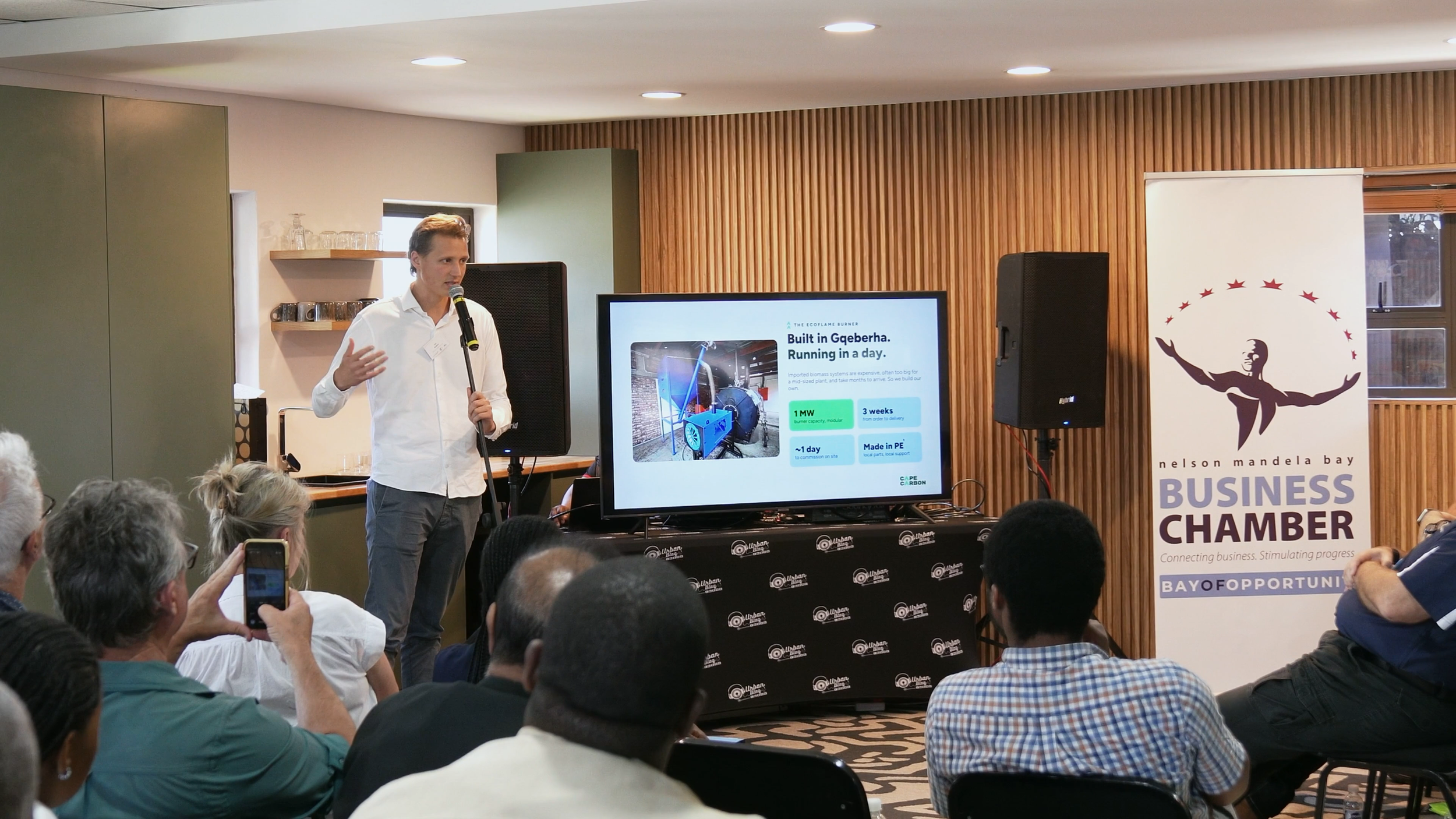 Cas Snijders presenting fuel price trends at the Coffee Morning