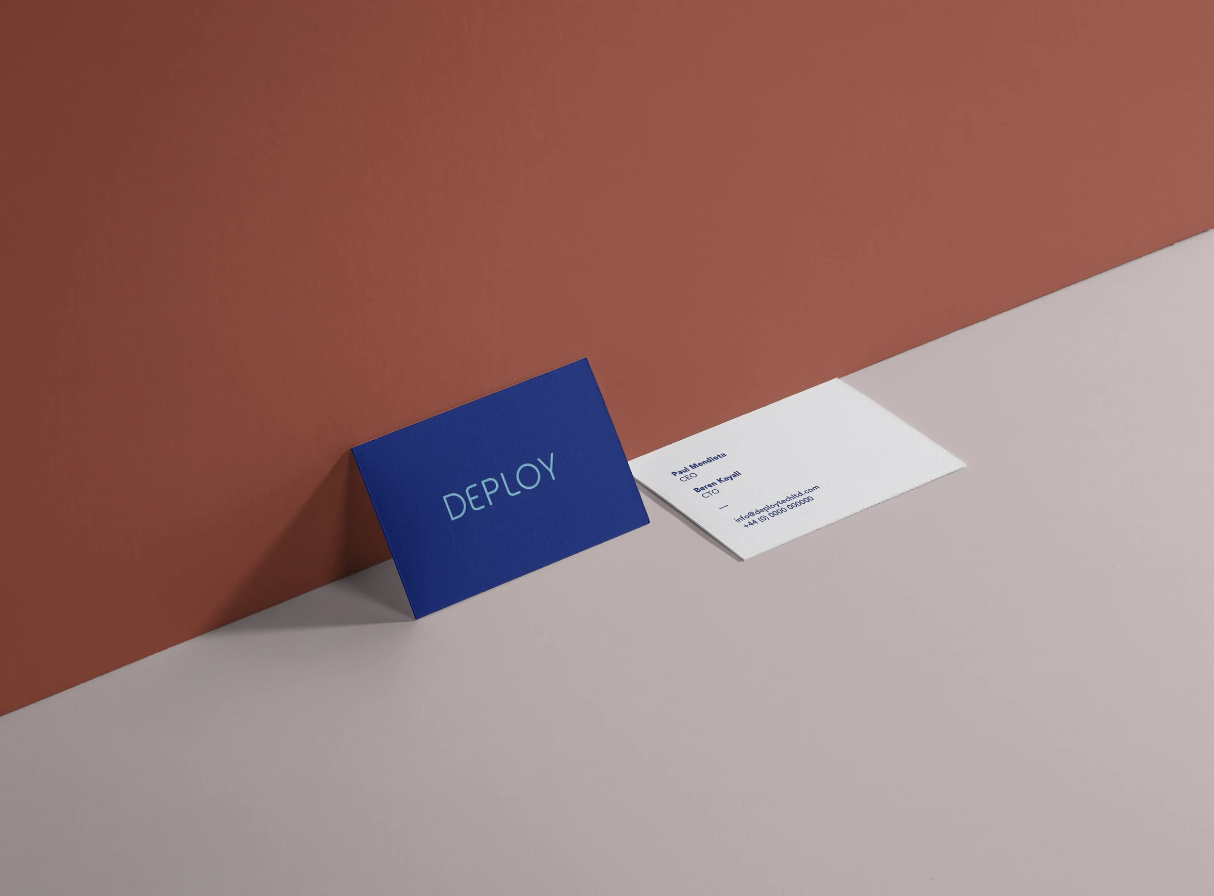Deploy Tech — business cards in Foundation blue and white, by StudioKus