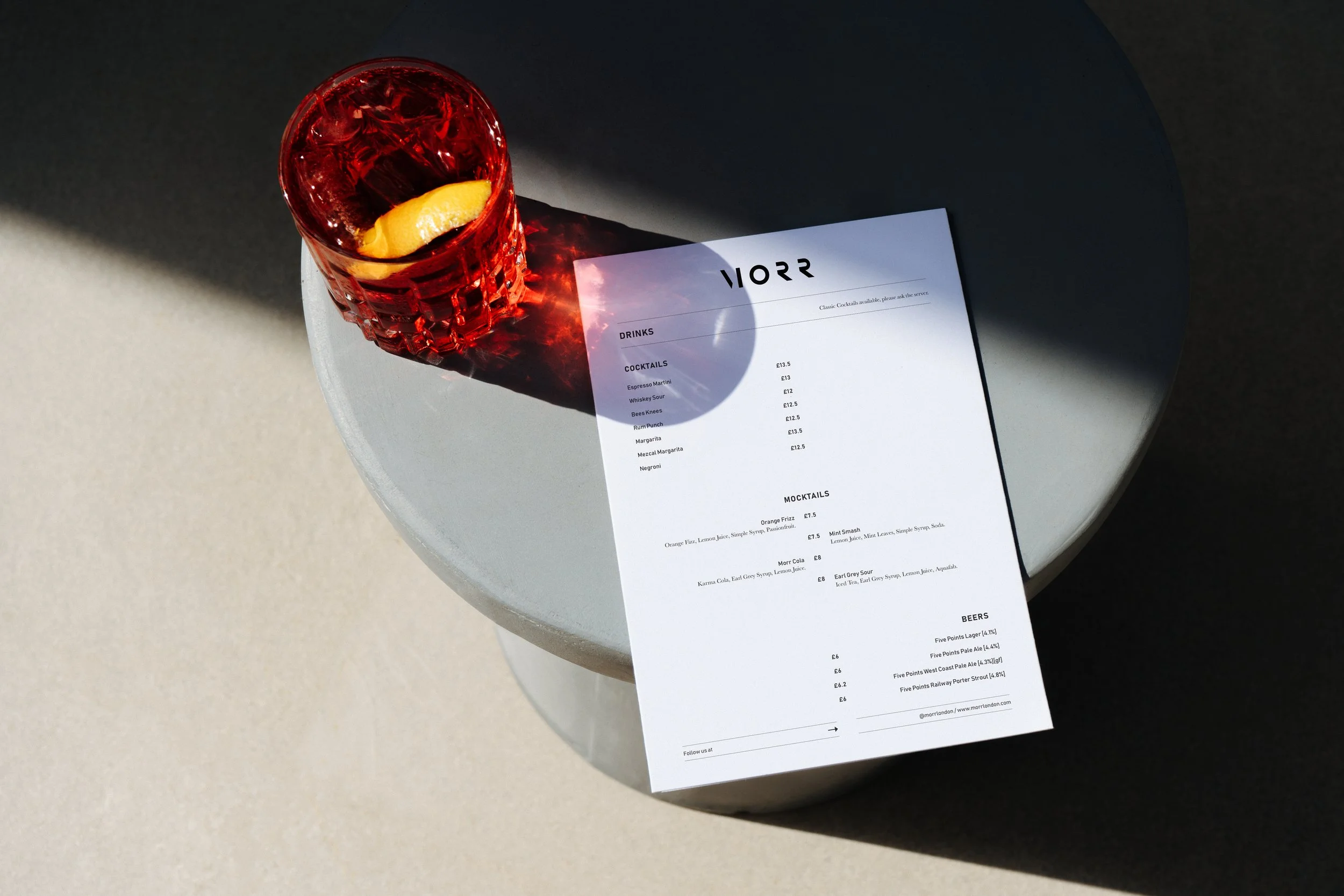 Morr — coffee cup with identity mark, mockup 05, by StudioKus