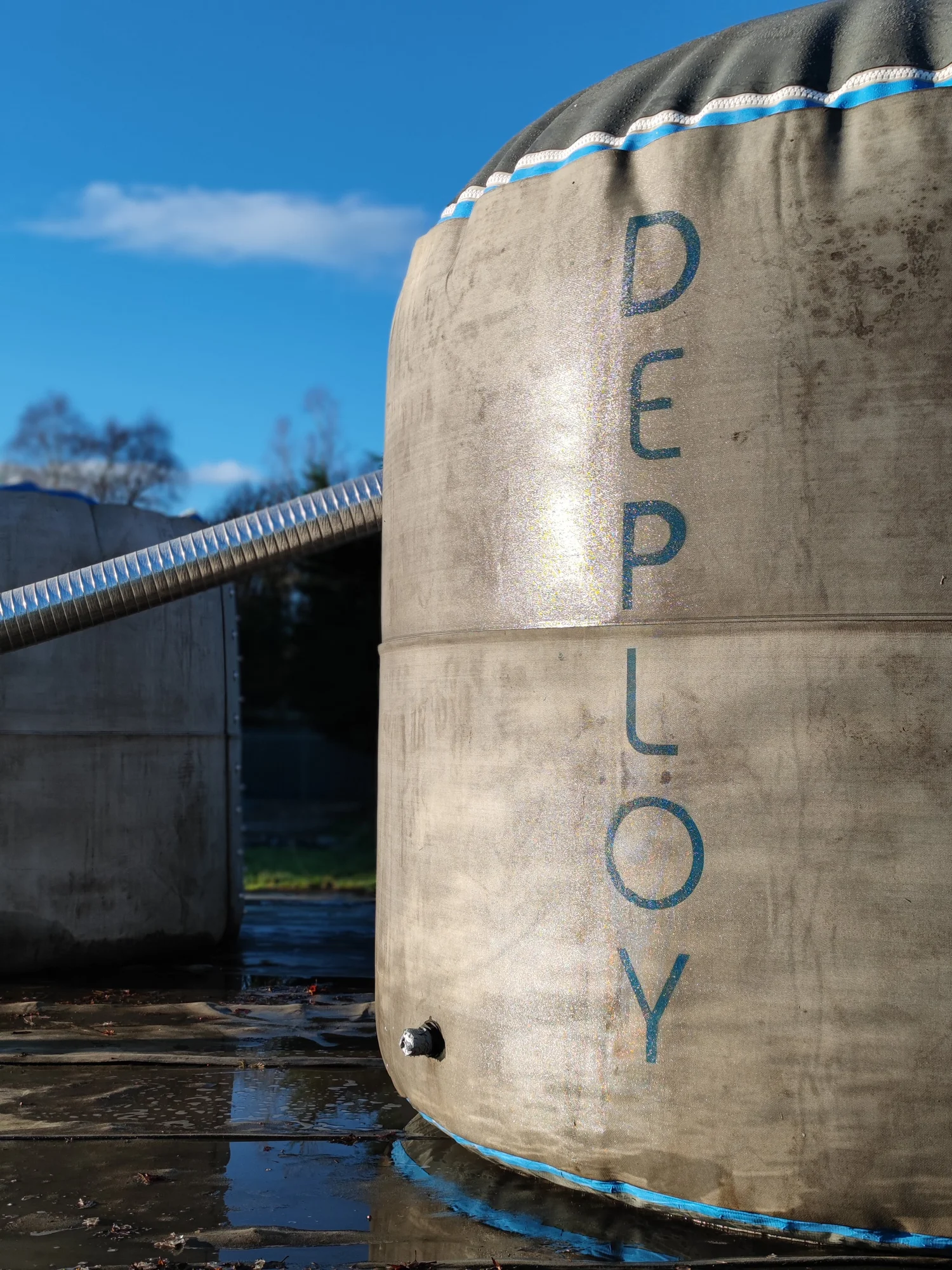 Deploy Tech — portable concrete water tank deployed in the field, real-world application