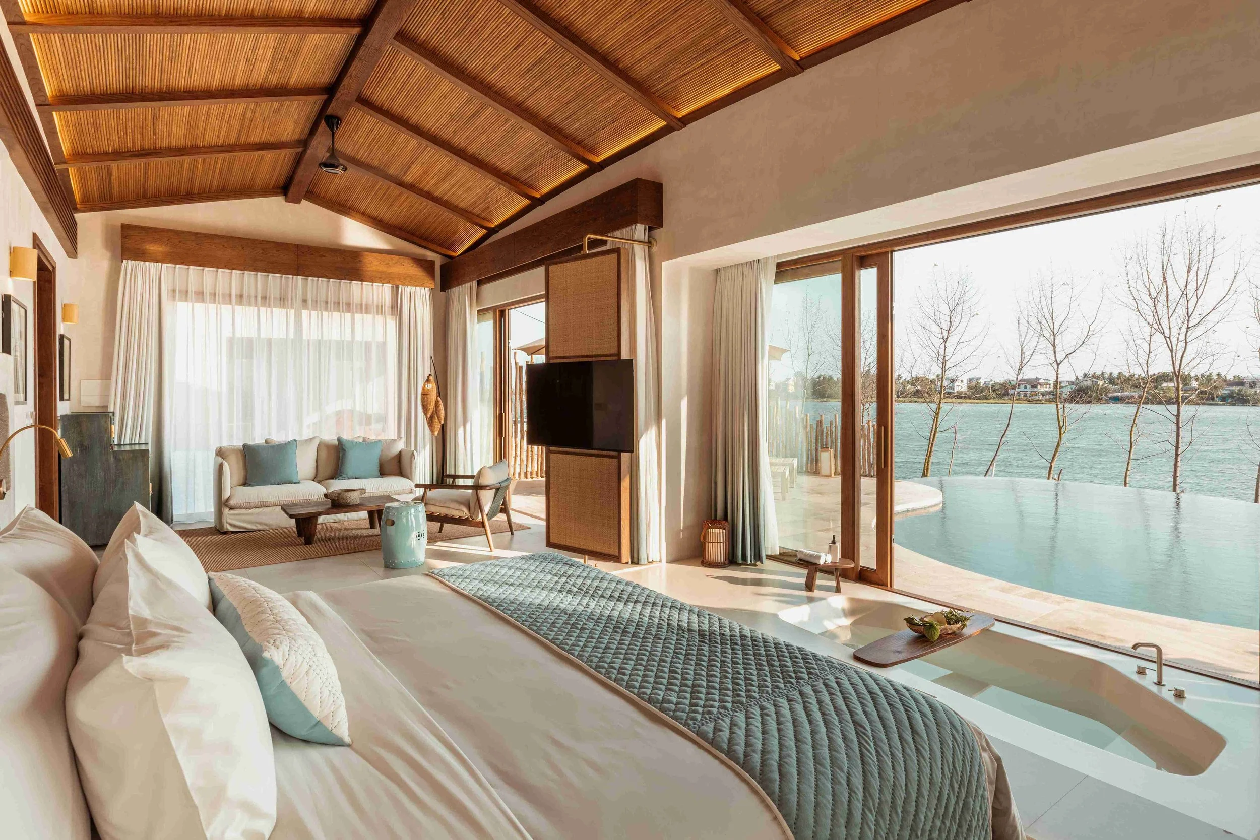 Private pool villa terrace on the Thu Bon River at Namia River Retreat, Hoi An, Vietnam