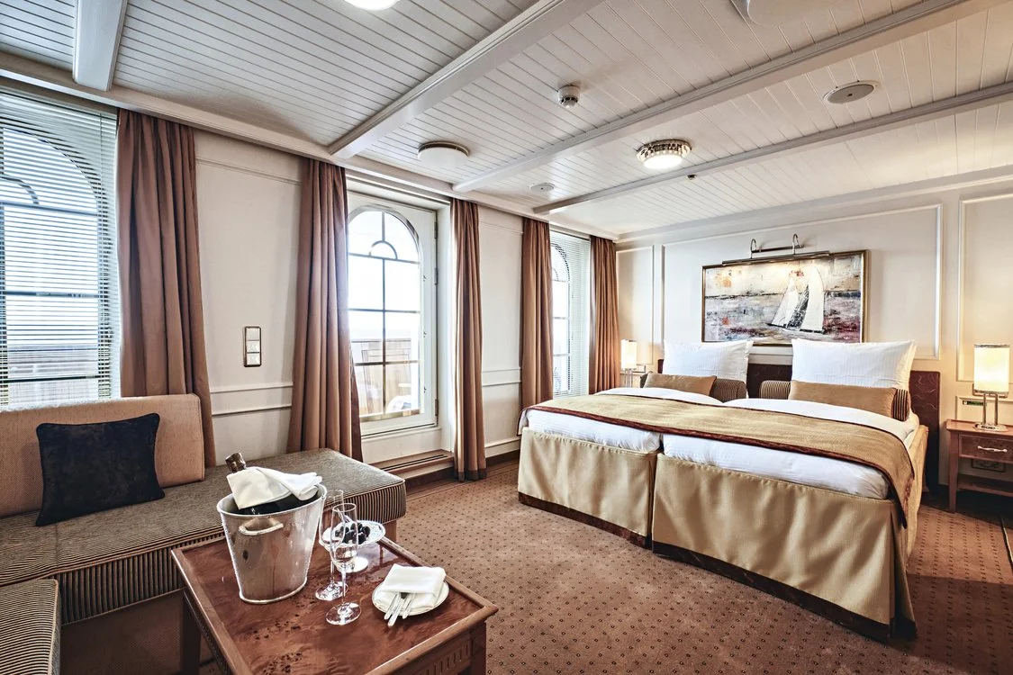 Sea Cloud Spirit cabin interior with private balcony over the Mediterranean