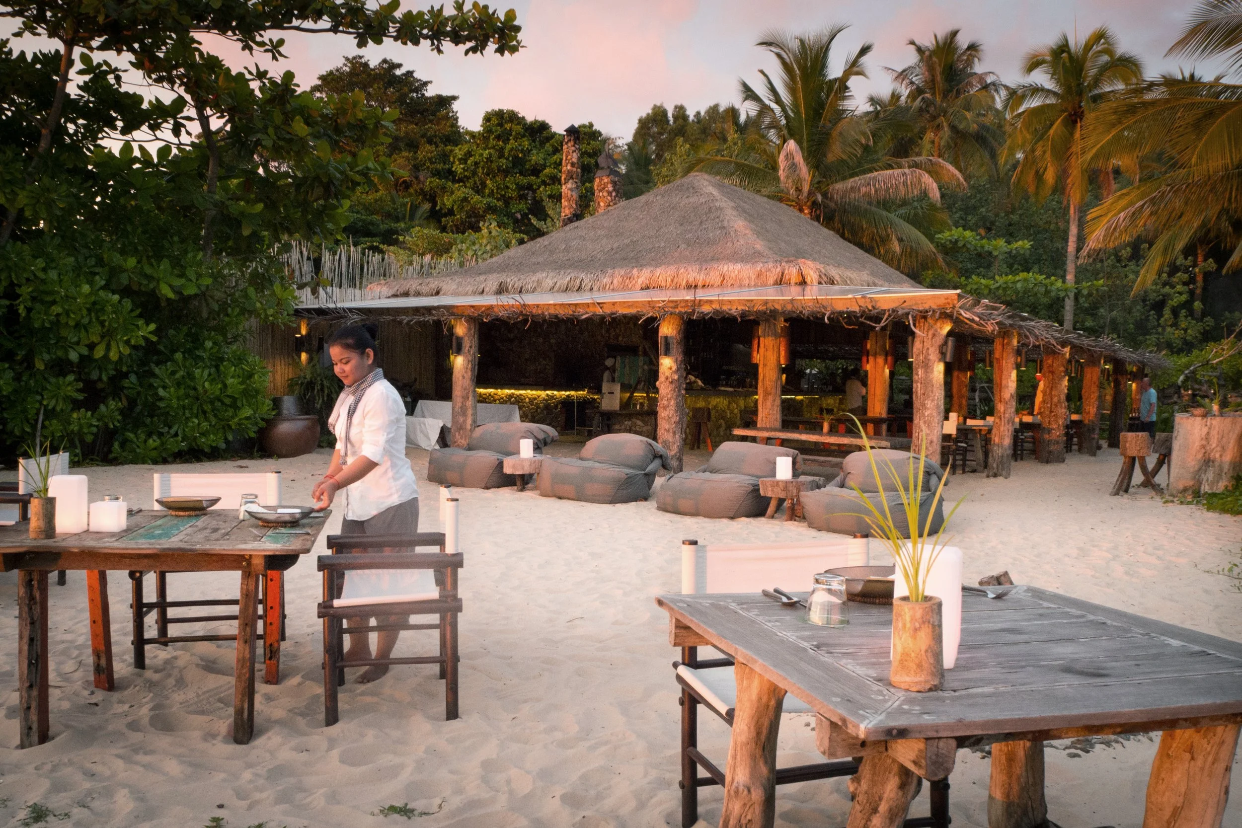 Destination-immersed dining set up on the beach at Song Saa Private Island, Cambodia