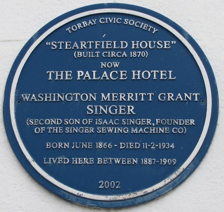 Blue plaque reading Torbay Civic Society, Steartfield House, built circa 1870, now The Palace Hotel, Washington Merritt Grant Singer, second son of Isaac Singer, founder of the Singer Sewing Machine Company, born June 1866, died 11 February 1934, lived here between 1887 and 1909
