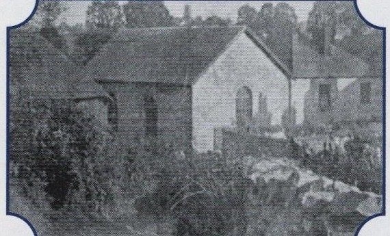 Historical photograph of a thatched cottage chapel with a small graveyard, captioned The Mother Church of Methodism in Barton, Torquay