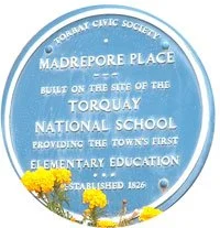 Torbay Civic Society blue plaque at Madrepore Place, Torquay, marking the site of the Torquay National School