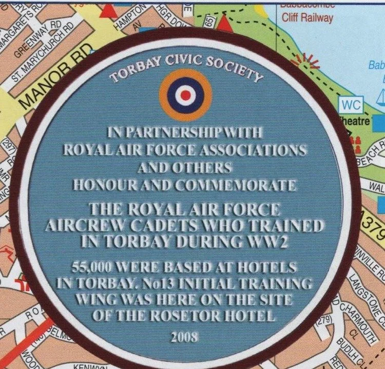 Blue plaque reading Torbay Civic Society, in partnership with Royal Air Force Associations and others honour and commemorate the Royal Air Force aircrew cadets who trained in Torbay during WW2, 55,000 were based at hotels in Torbay, No13 Initial Training Wing was here on the site of the Rosetor Hotel, 2008