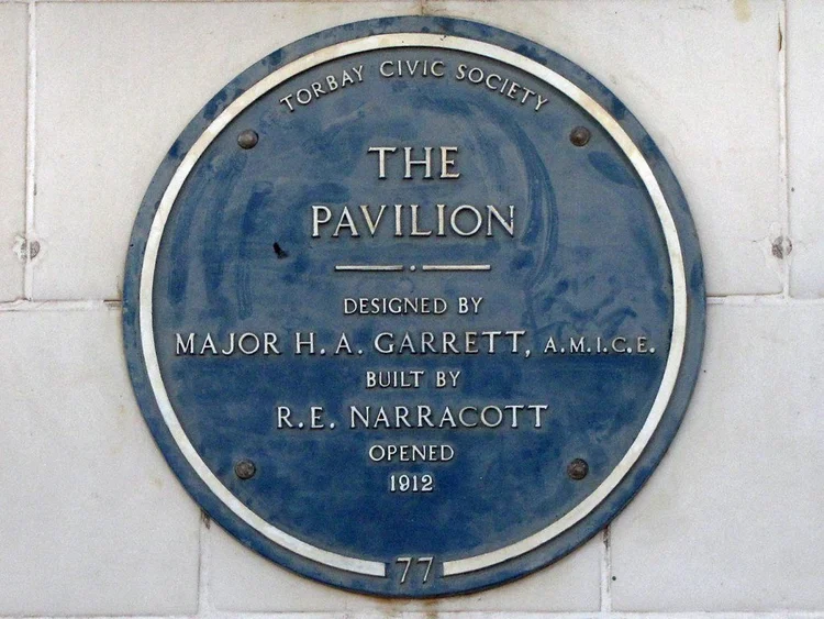 Torbay Civic Society blue plaque: The Pavilion, designed by Major H.A. Garrett, A.M.I.C.E., built by R.E. Narracott, opened 1912. Number 77.
