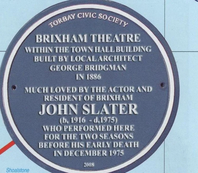 Blue plaque reading Torbay Civic Society, Brixham Theatre, within the Town Hall building built by local architect George Bridgman in 1886, much loved by the actor and resident of Brixham John Slater, born 1916 died 1975, who performed here for the two seasons before his early death in December 1975, 2008