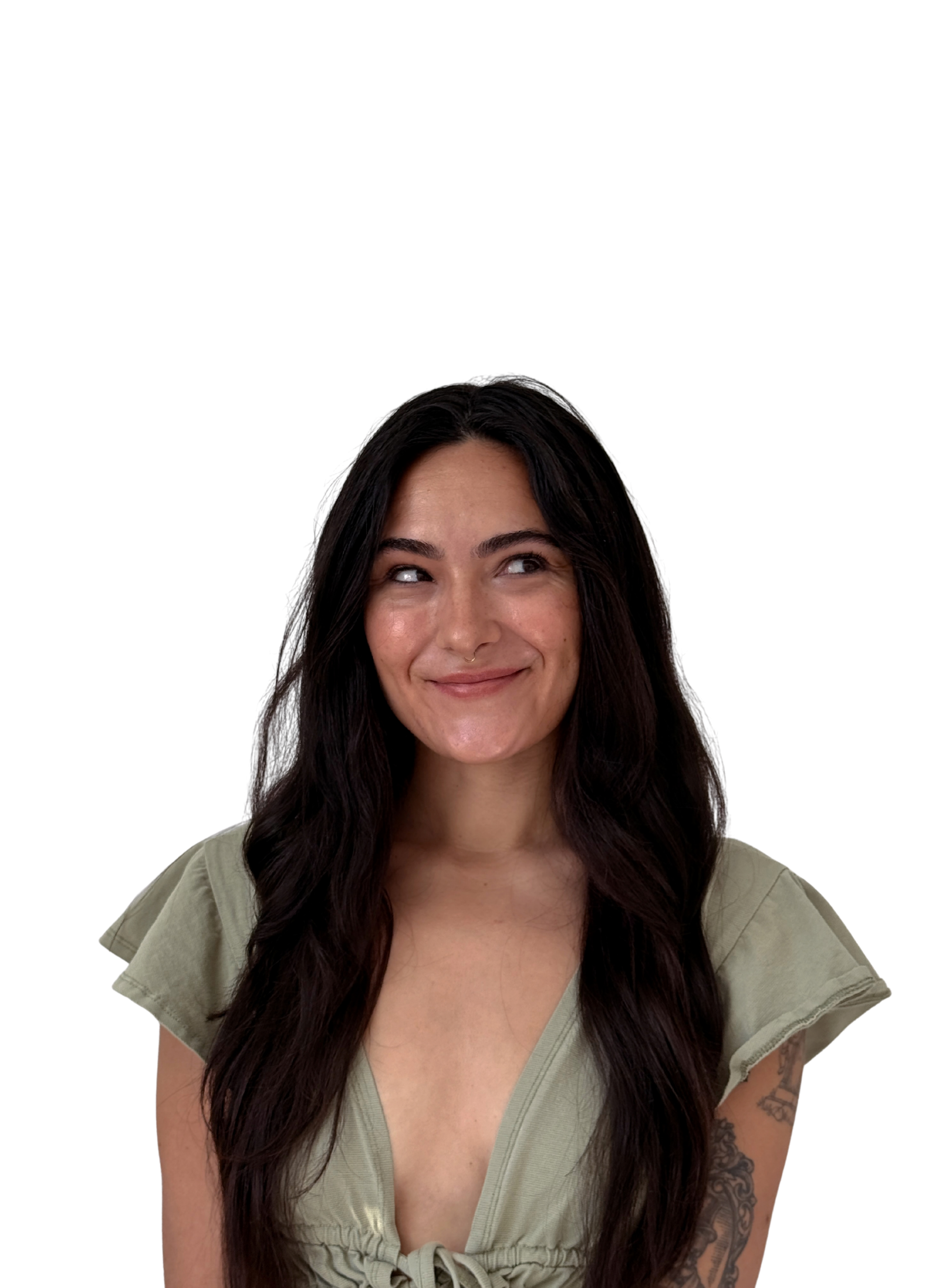 Haley smiling in a sage-green top, looking toward her introduction
