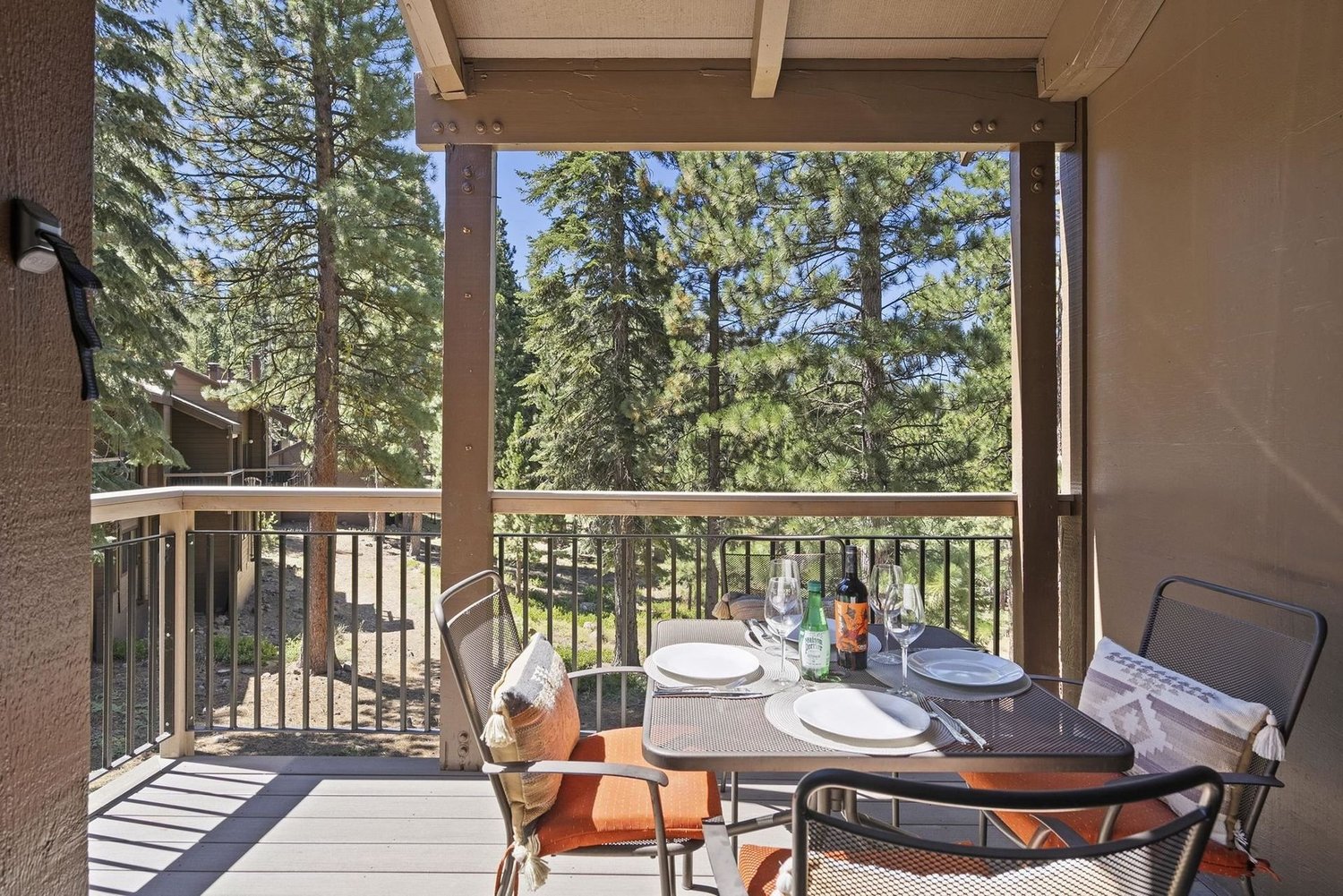 Private balcony dining in the pines