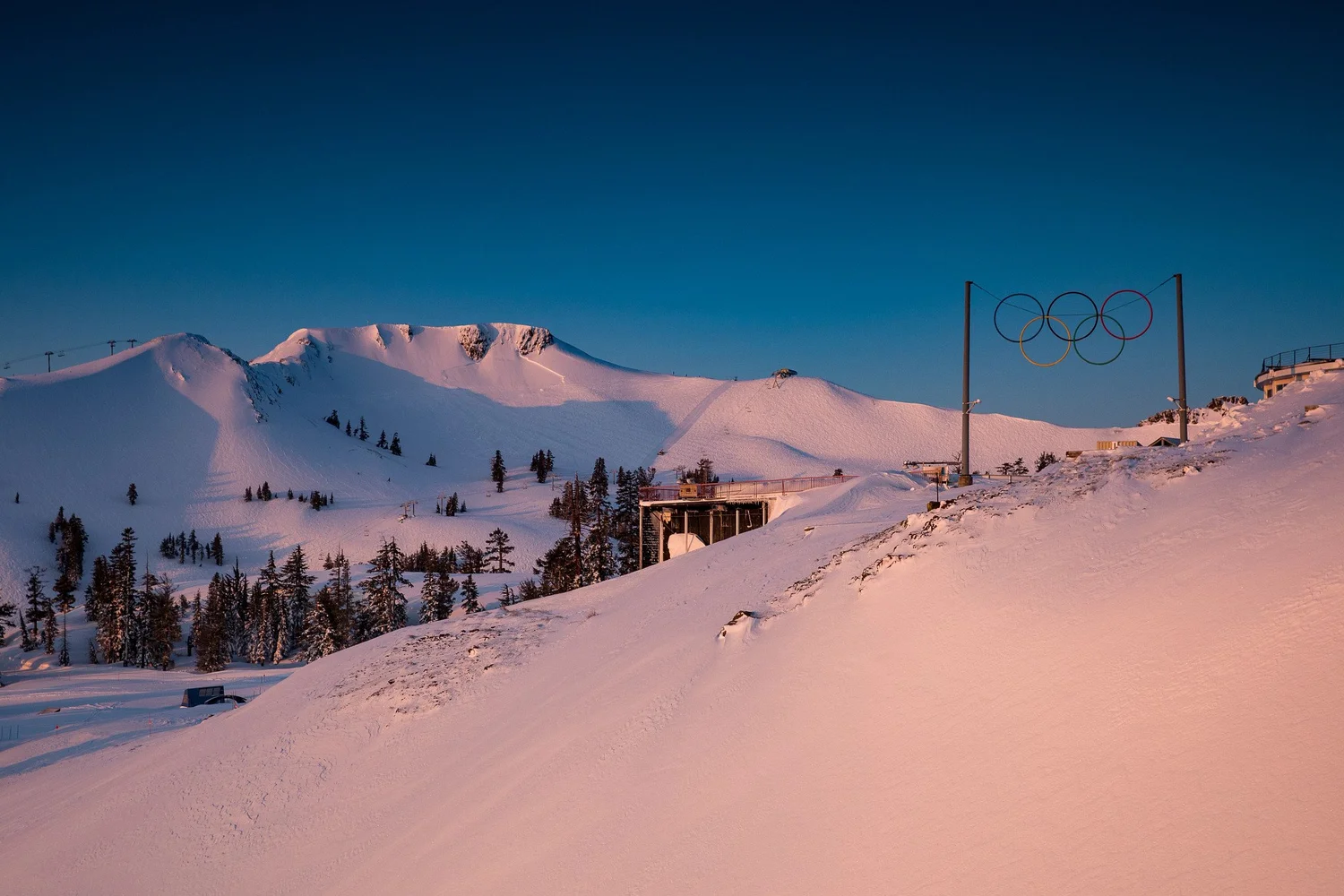 Alpenglow over Olympic Valley and the Olympic rings