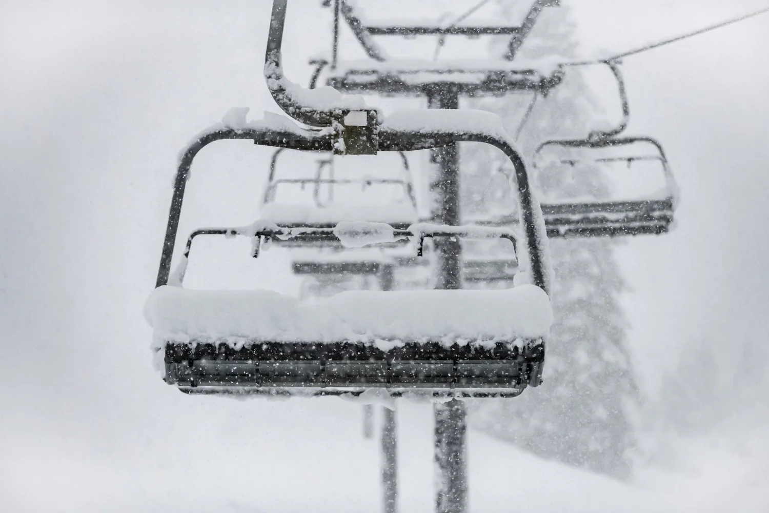 Chairlift loaded with new snow