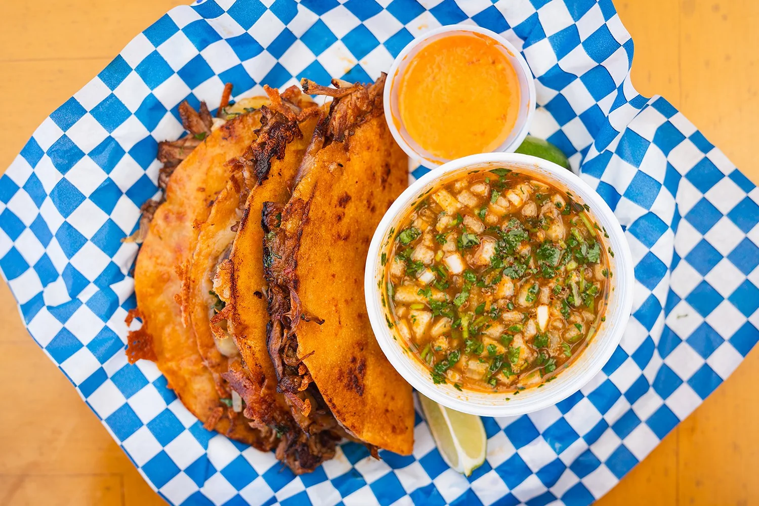 Birria tacos and consomme
