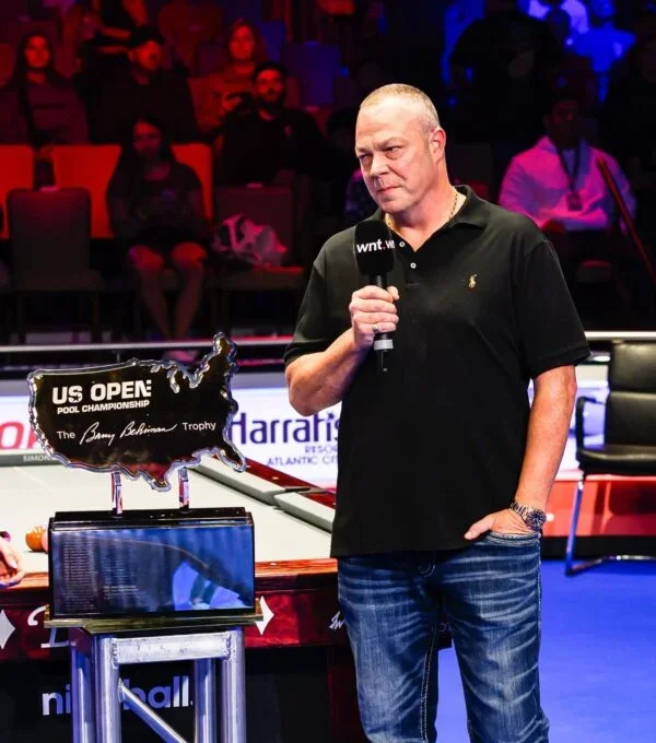 Scott Frost on the World Nineball Tour microphone beside the US Open trophy