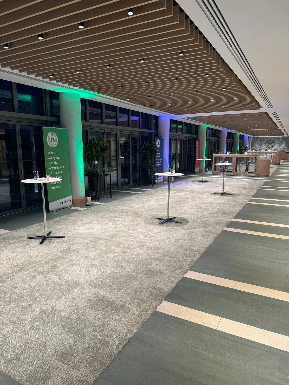 The concourse set with poseur tables and Merton Borough of Sport banners