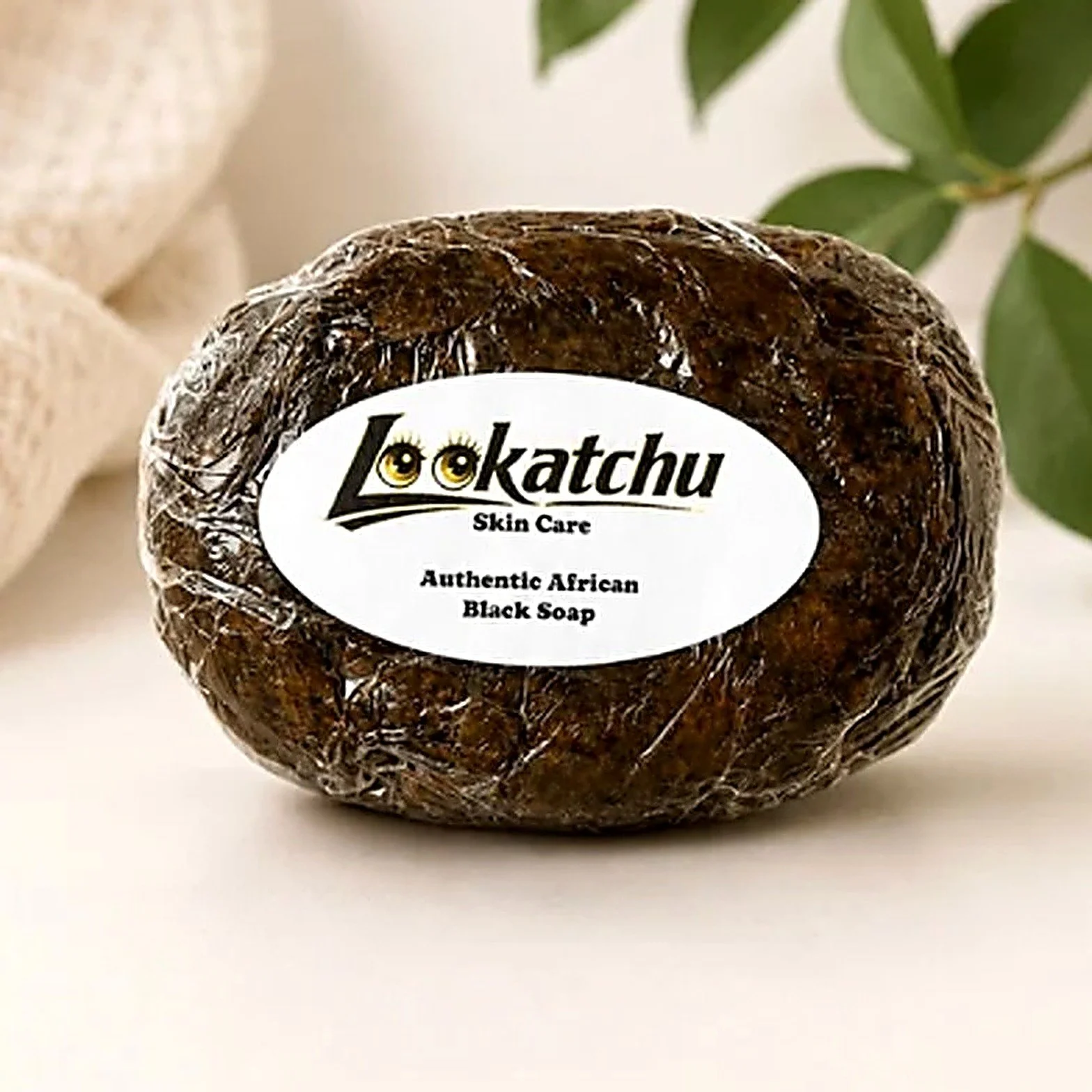 Authentic African black soap bar wrapped in clear film