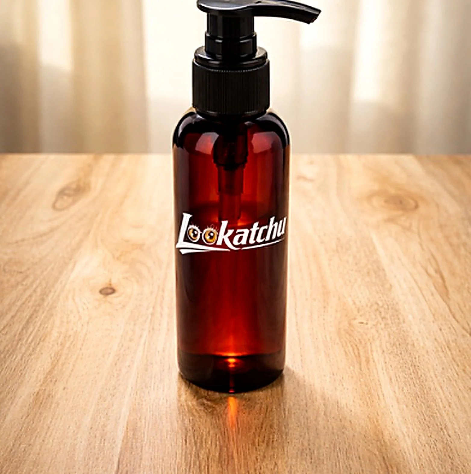 Amber bottle of Lookatchu fragrance oil with pump