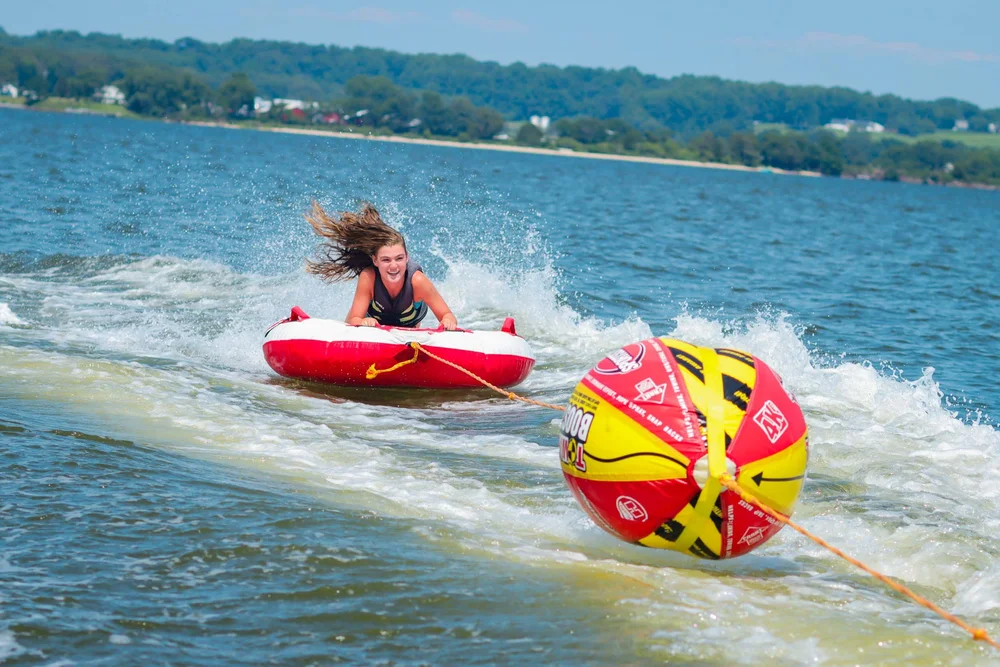 Girl tubing on the lake