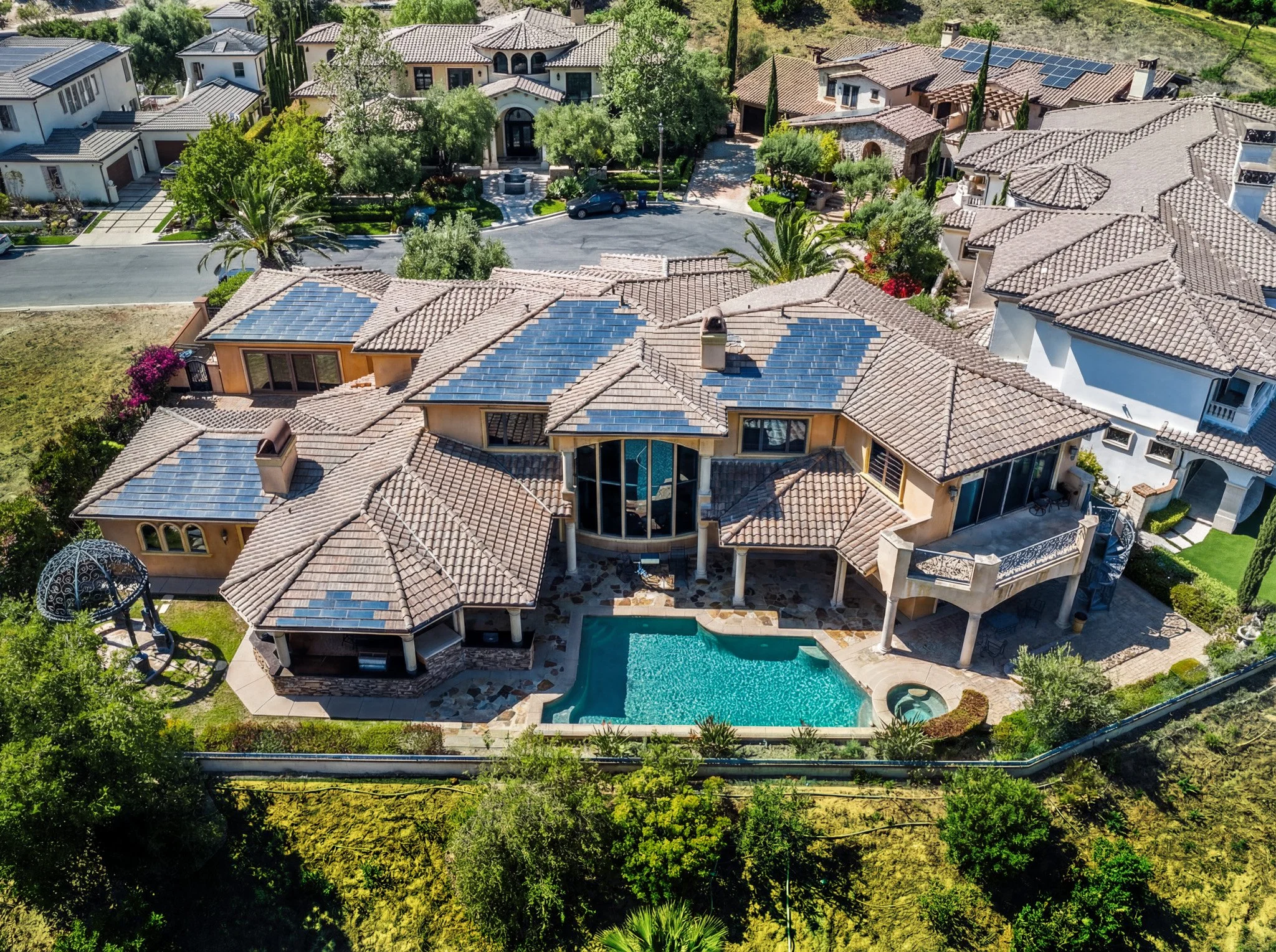 Aerial view of pool and estate — 16293 Domani Terrace