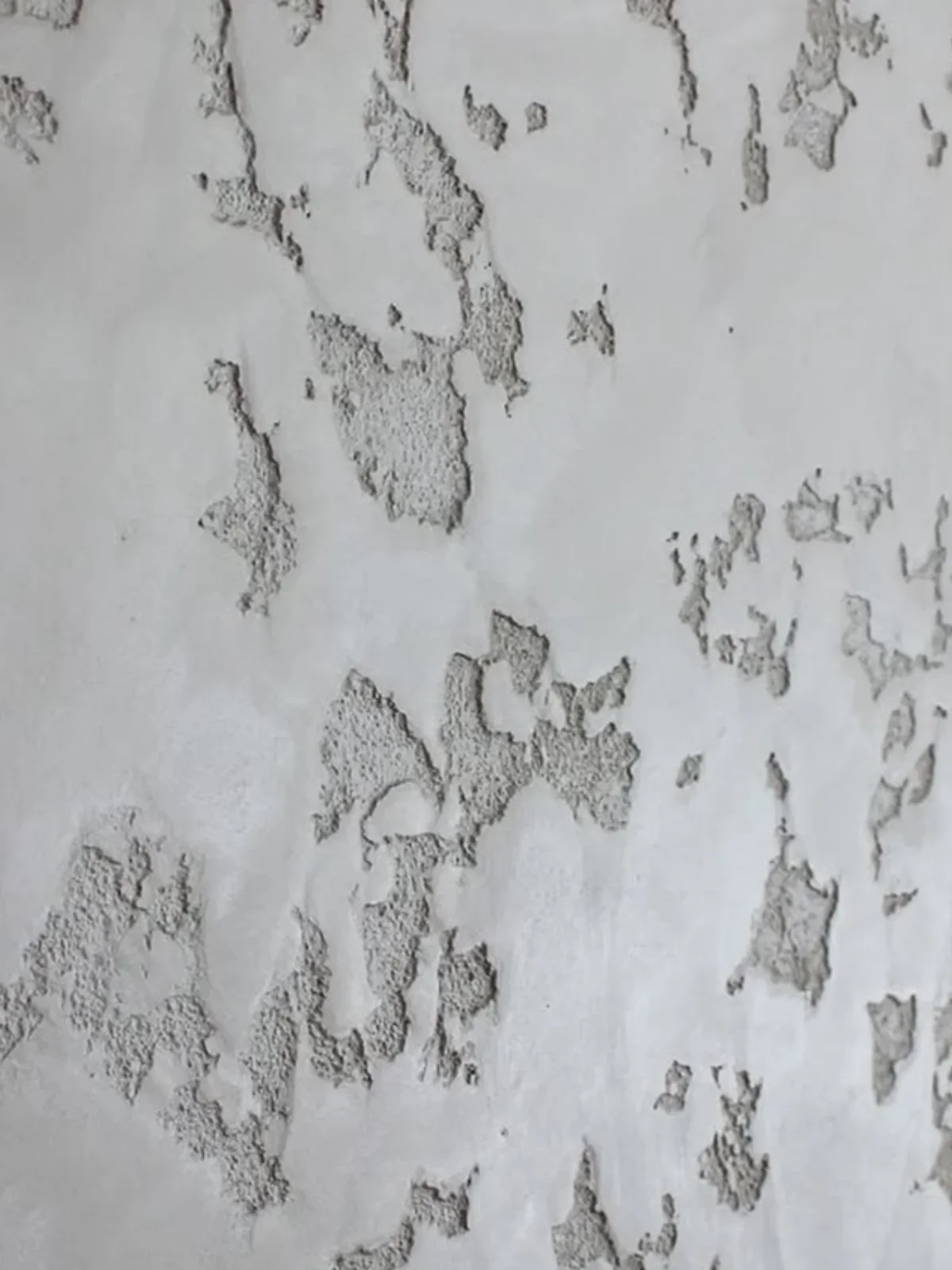 Split stone textured plaster showing depth and fracture