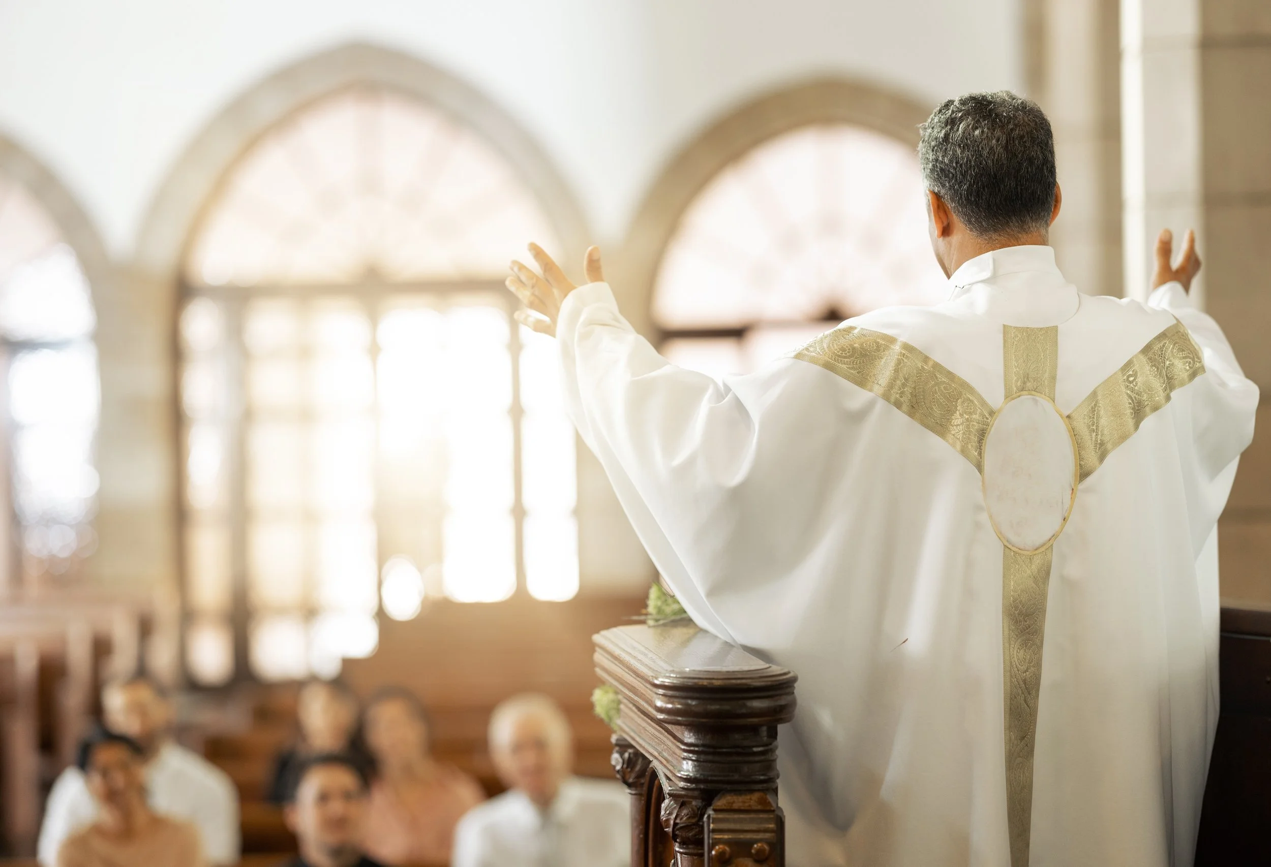 A faith leader with a congregation member