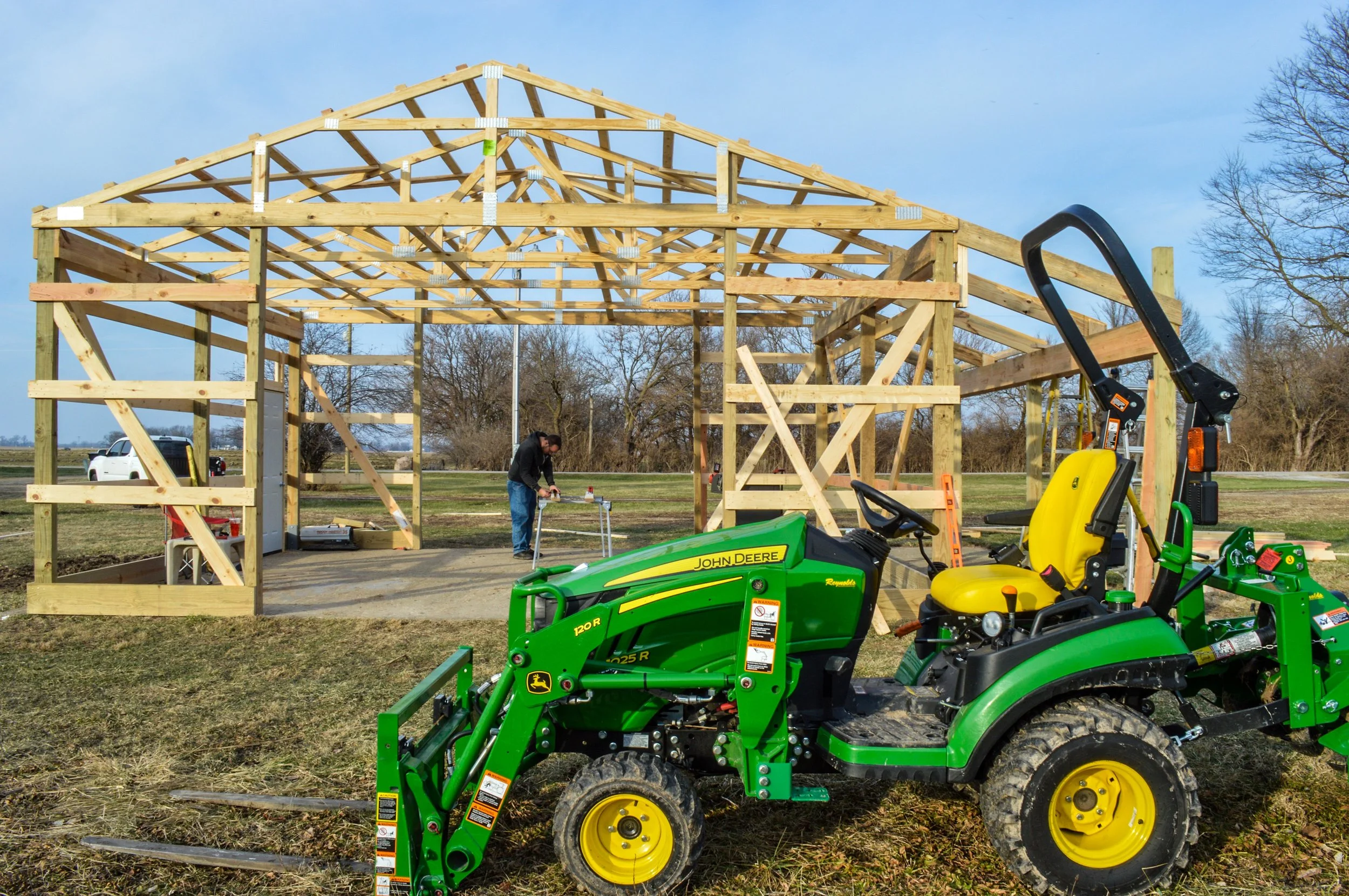The first new barn going up at Waymire Farms, with the John Deere 1025R in the foreground