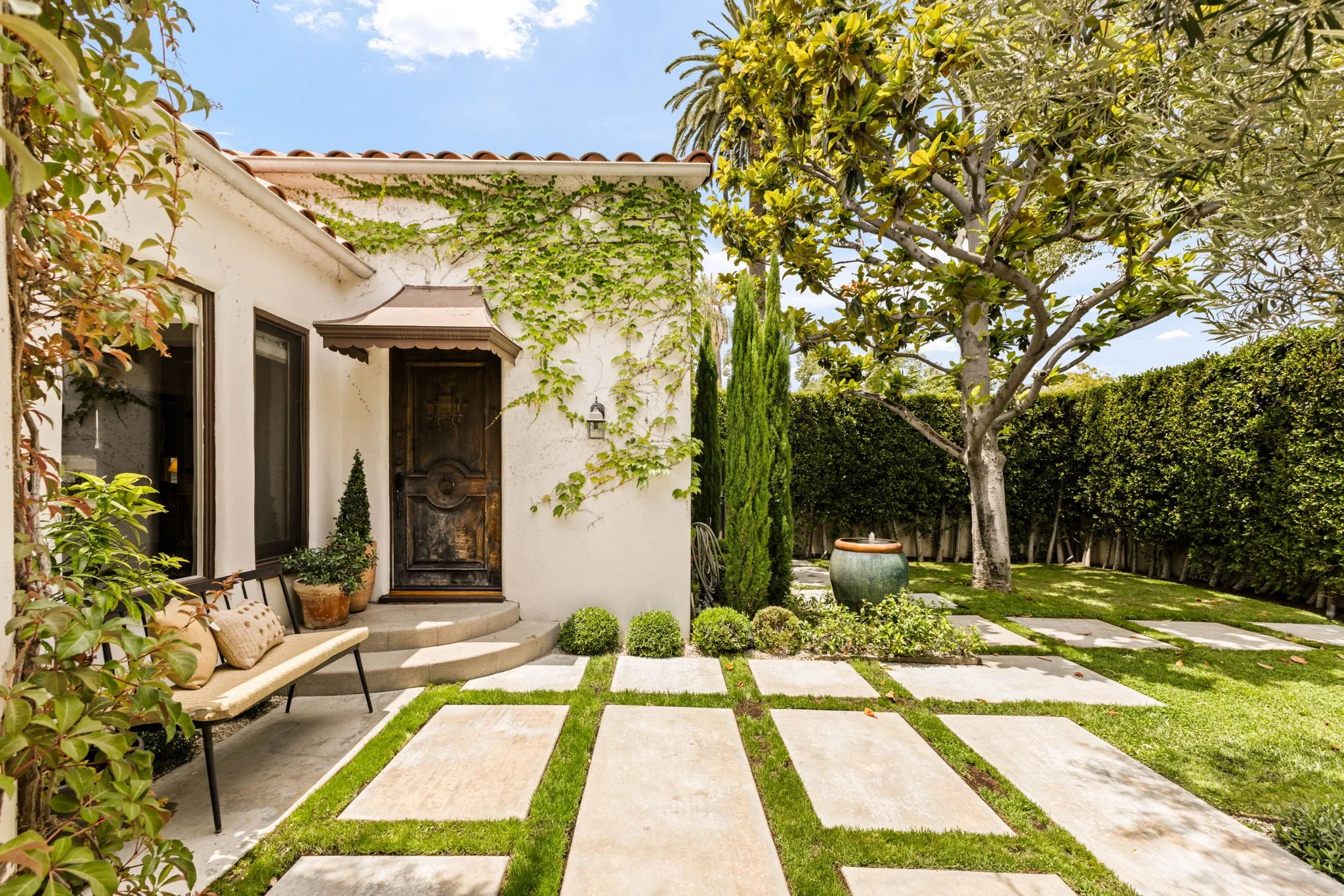 Garden entrance of a Spanish-style home in Beverly Grove