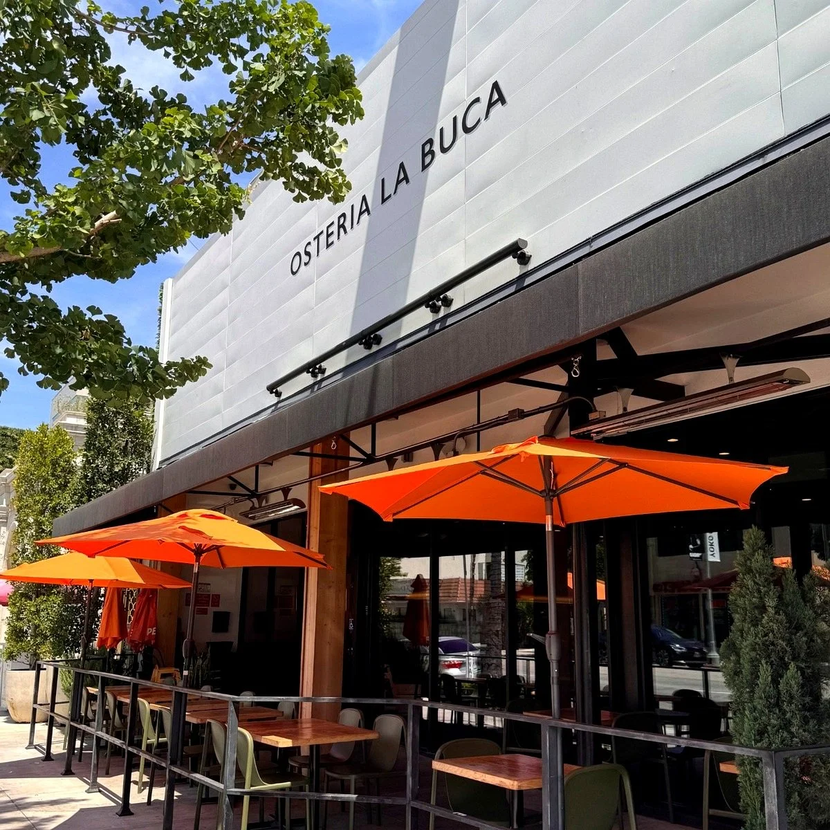 Outdoor patio seating at Osteria La Buca