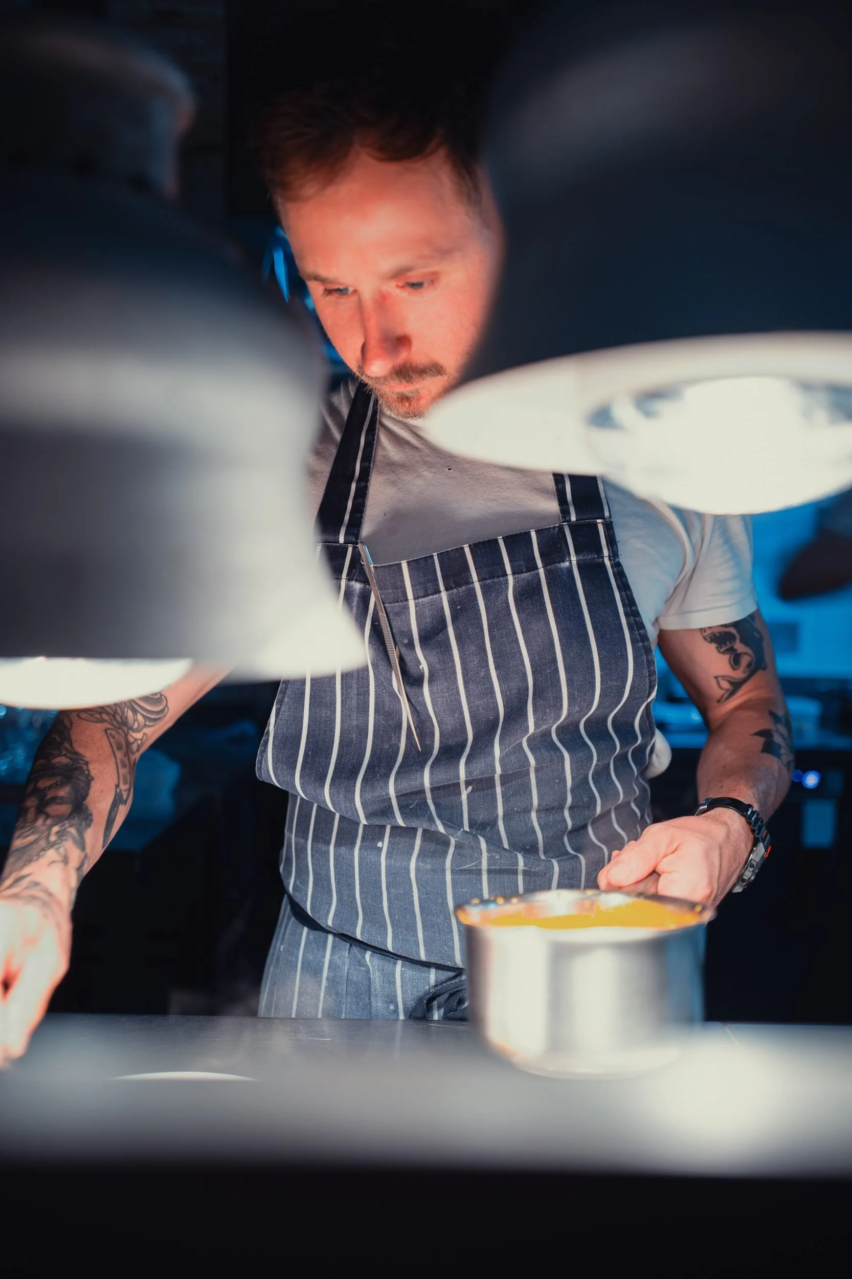 Chef glasses plating orange bisque